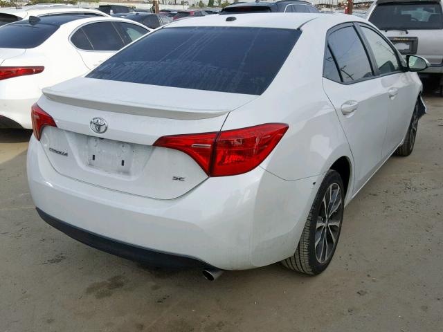 5YFBURHE2HP583397 - 2017 TOYOTA COROLLA L WHITE photo 4