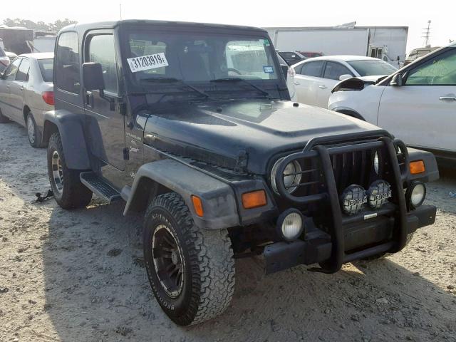 1J4FY19S6XP490596 - 1999 JEEP WRANGLER / BLACK photo 1