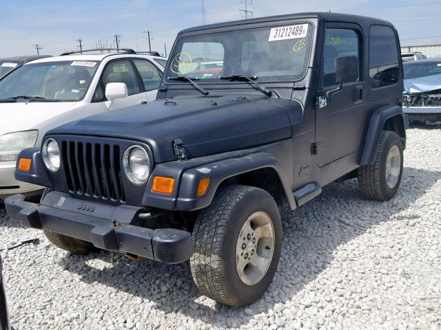 1J4FA49S9YP747029 - 2000 JEEP WRANGLER / BLACK photo 2