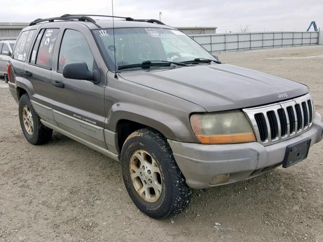 1J4GW58S3XC745912 - 1999 JEEP GRAND CHER GRAY photo 1