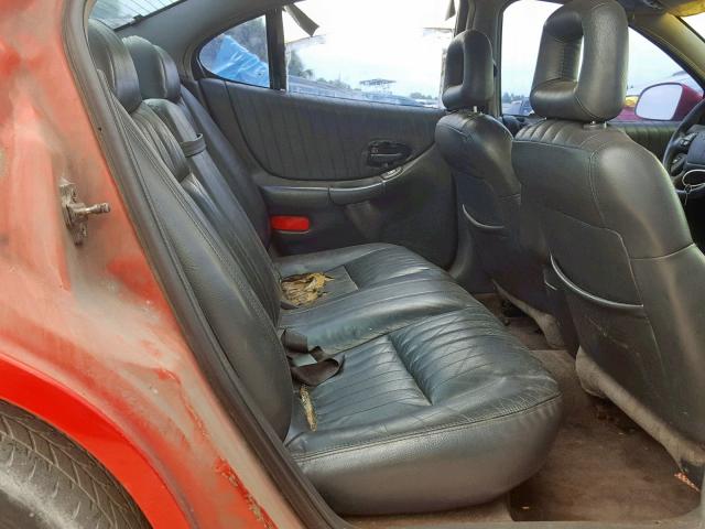 1G2WP521XVF345294 - 1997 PONTIAC GRAND PRIX RED photo 6