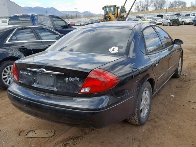 1FAFP56SXYA252197 - 2000 FORD TAURUS SEL BLACK photo 4