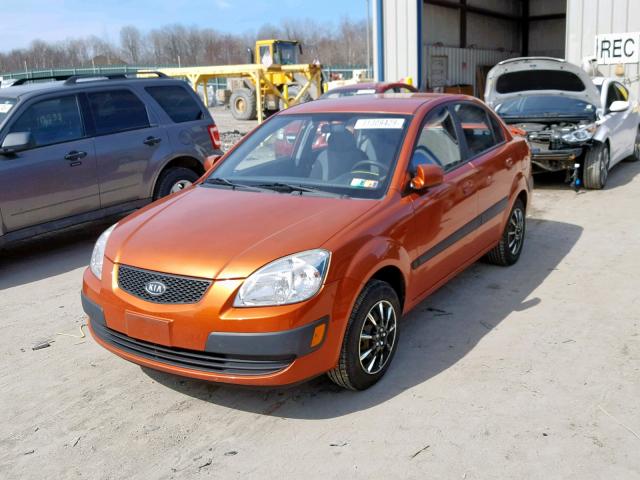 KNADE223X96454320 - 2009 KIA RIO BASE ORANGE photo 2