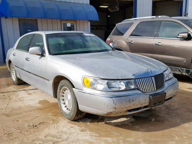 1LNHM81W8YY865106 - 2000 LINCOLN TOWN CAR E SILVER photo 1