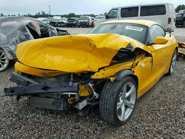 WBALM7C55DE385241 - 2013 BMW Z4 SDRIVE3 YELLOW photo 2