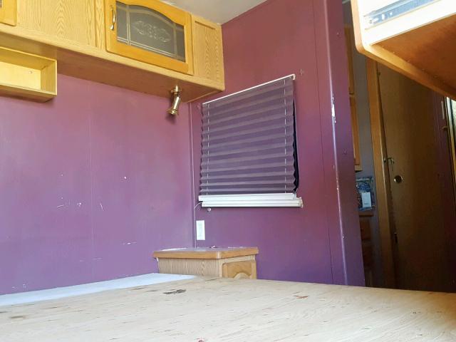 4YDF368204D507633 - 2004 KEYSTONE MONTANA WHITE photo 5