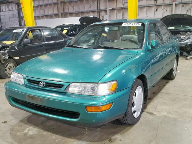 1NXBB02EXVZ506815 - 1997 TOYOTA COROLLA DX GREEN photo 2