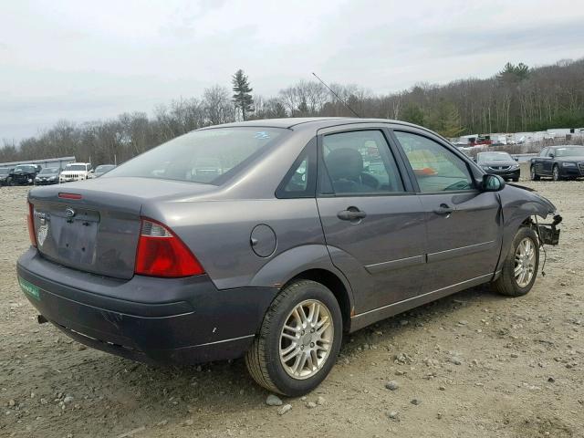 1FAFP34NX7W121483 - 2007 FORD FOCUS ZX4 GRAY photo 4