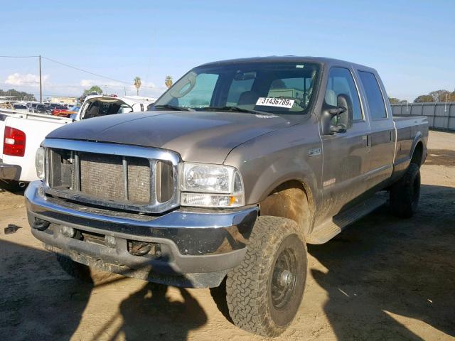 1FTSW31P34ED95398 - 2004 FORD F350 SRW S TAN photo 2