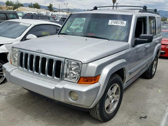 1J8HH48K29C556789 - 2009 JEEP COMMANDER SILVER photo 2