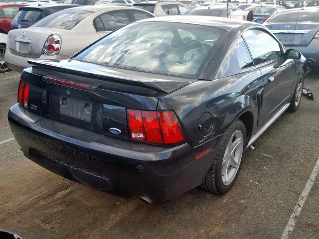 1FAFP42X5YF285655 - 2000 FORD MUSTANG GT BLACK photo 4