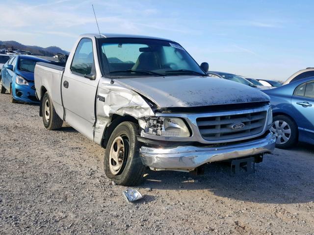 2FTRF17224CA33292 - 2004 FORD F-150 HERI SILVER photo 1