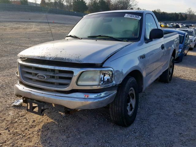 2FTRF17224CA33292 - 2004 FORD F-150 HERI SILVER photo 2