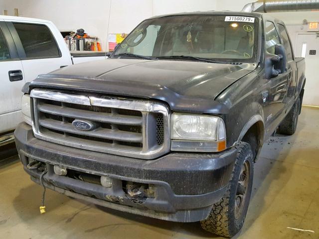 1FTSW31P24EA86683 - 2004 FORD F350 SRW S BLACK photo 2