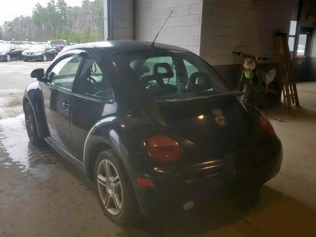 3VWCC21C6XM446229 - 1999 VOLKSWAGEN NEW BEETLE შავი ფოტო 3