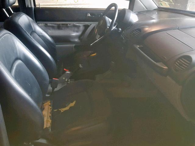 3VWCC21C6XM446229 - 1999 VOLKSWAGEN NEW BEETLE შავი ფოტო 5