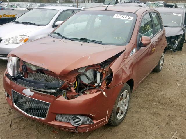 KL1TD6DE1BB251232 - 2011 CHEVROLET AVEO LS ORANGE photo 2