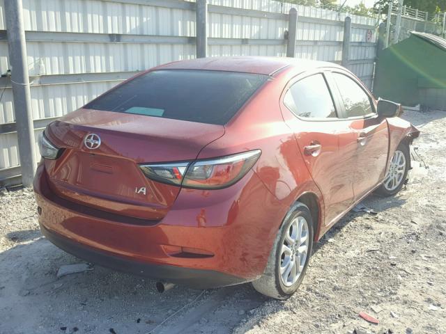 3MYDLBZV6GY120129 - 2016 TOYOTA SCION IA RED photo 4