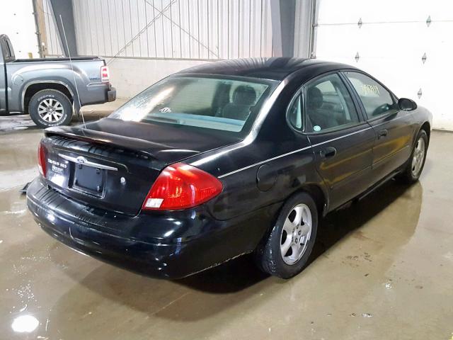 1FAFP55232A204422 - 2002 FORD TAURUS SES BLACK photo 4