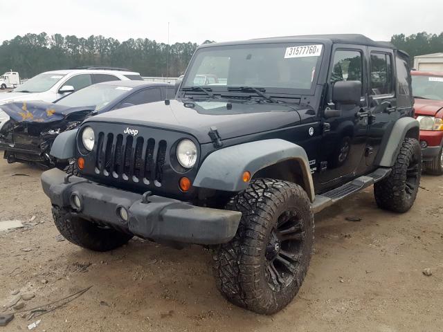 1C4BJWDG4CL177590 - 2012 JEEP WRANGLER UNLIMITED SPORT  photo 2