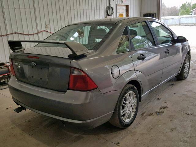 1FAFP34N97W118428 - 2007 FORD FOCUS ZX4 GRAY photo 4