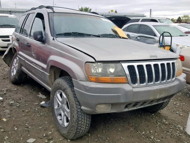 1J4GW58SXXC562443 - 1999 JEEP GRAND CHER GRAY photo 1