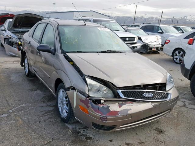 1FAFP34N45W122982 - 2005 FORD FOCUS ZX4 TAN photo 1