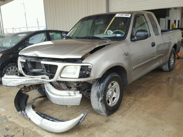 2FTRX17254CA60483 - 2004 FORD F-150 HERI GOLD photo 2