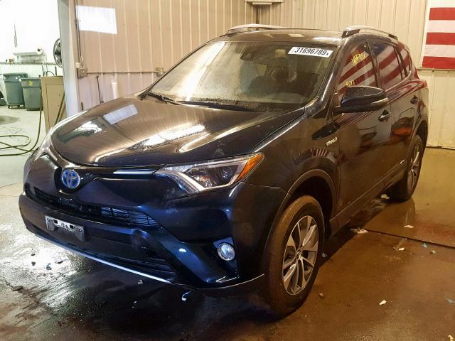 JTMRJREV9JD172017 - 2018 TOYOTA RAV4 HV LE BLUE photo 2