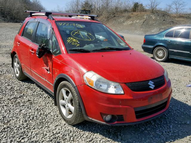 JS2YB417596201358 - 2009 SUZUKI SX4 TOURIN RED photo 1