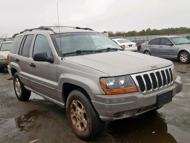 1J4GW48S7YC329373 - 2000 JEEP GRAND CHER GRAY photo 1