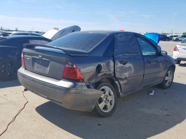 1FAHP34N37W287109 - 2007 FORD FOCUS ZX4 GRAY photo 4