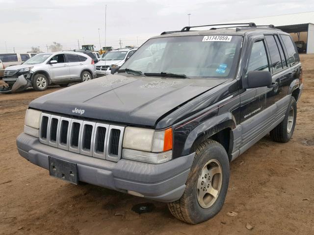 1J4GZ58S9VC622328 - 1997 JEEP GRAND CHER BLACK photo 2