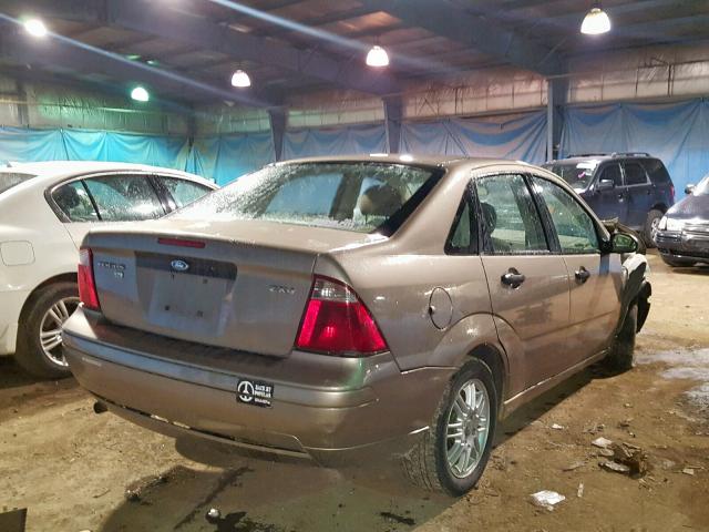 1FAFP34N15W266327 - 2005 FORD FOCUS ZX4 TAN photo 4