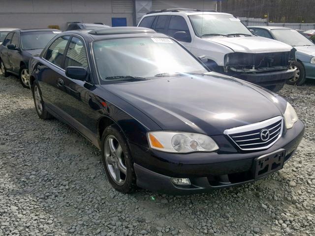 JM1TA222321724265 - 2002 MAZDA MILLENIA S BLACK photo 1