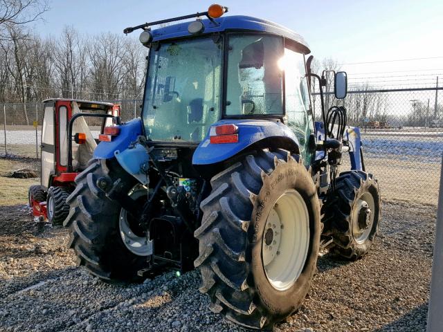 Y9WLE1015 - 2010 NEWH TRACTOR BLUE photo 4