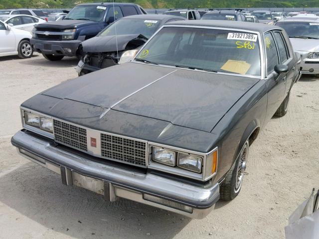 1G3AM69Y3EM451542 - 1984 OLDSMOBILE CUTLASS SU GREEN photo 2