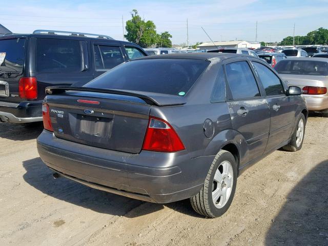 1FAHP34NX7W264135 - 2007 FORD FOCUS ZX4 GRAY photo 4