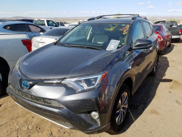 JTMRJREV8JD251615 - 2018 TOYOTA RAV4 HV LE  photo 2