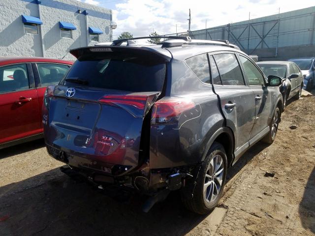 JTMRJREV8JD251615 - 2018 TOYOTA RAV4 HV LE  photo 4