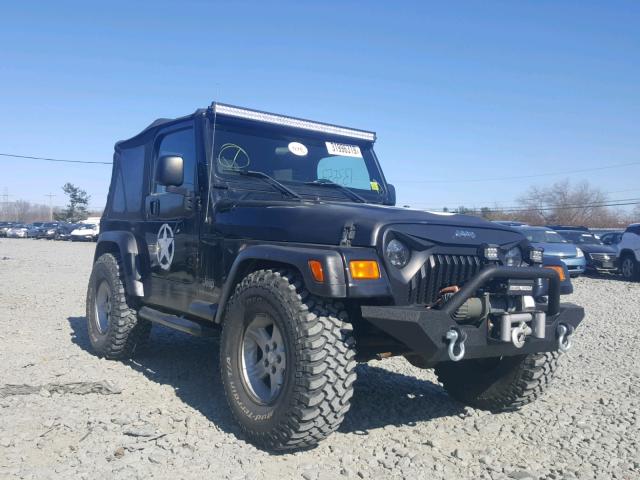 1J4FA29134P751874 - 2004 JEEP WRANGLER / BLACK photo 1