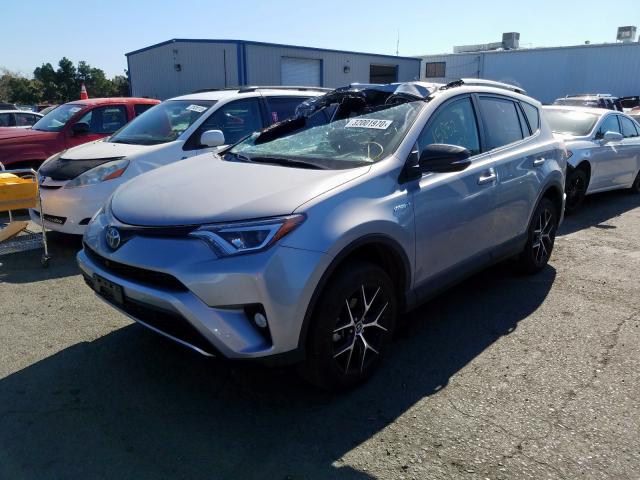 JTMJJREV9JD231063 - 2018 TOYOTA RAV4 HV SE  photo 2