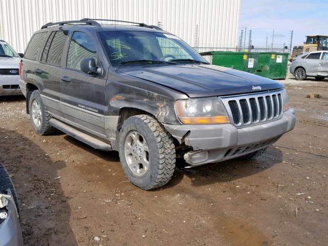 1J4GW58N8XC767530 - 1999 JEEP GRAND CHER GRAY photo 1