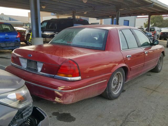 2FAFP73W5XX131585 - 1999 FORD CROWN VICT RED photo 4