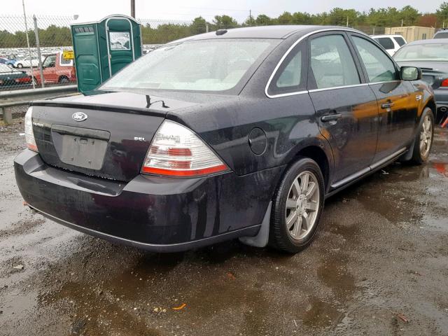 1FAHP24W69G104821 - 2009 FORD TAURUS SEL BLACK photo 4