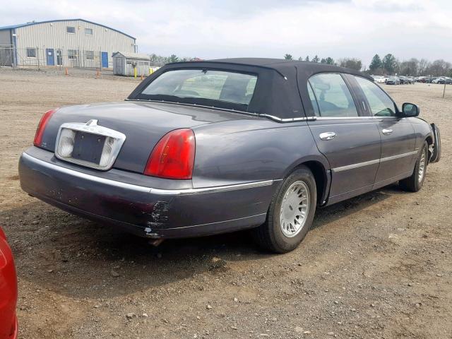 1LNHM85WX1Y628732 - 2001 LINCOLN TOWN CAR C BLACK photo 4