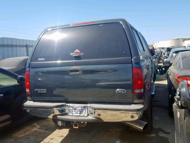 1FTSW31P44EB38265 - 2004 FORD F350 SRW S BLACK photo 4