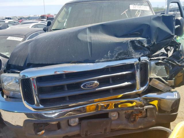 1FTSW31P44EB38265 - 2004 FORD F350 SRW S BLACK photo 7