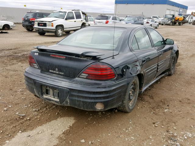 1G2NE52T61M500030 - 2001 PONTIAC GRAND AM S BLACK photo 4