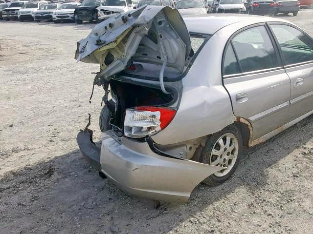 KNADC125636229062 - 2003 KIA RIO SILVER photo 10